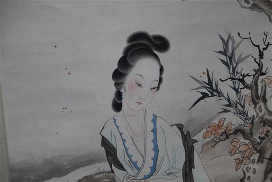 Chinese School, 20th century. A scroll painting of a lady in a rockwork landscape, image 126.5 x 39cm